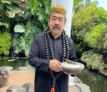 Jadi Pawang Hujan