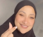 Pakai Mukena Hitam