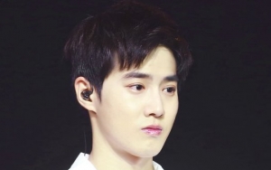 Foto Candid Suho EXO Bareng Anak Kecil di Manila Ini Bikin Fans Gemas