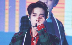 Santai Usap Hidung Berdarah di Atas Panggung, Profesionalitas Renjun NCT Dipuji