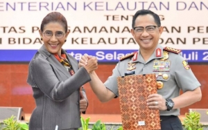 KKP Gandeng Polri Demi Amankan Laut Indonesia, 'Usaha' Menteri Susi Tutupi Tato Kaki Jadi Sorotan