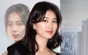 Pose Cantik Pegang Buket di Hari Perilisan Film, Suzy Dipuji Lebih Cantik dari Bunganya
