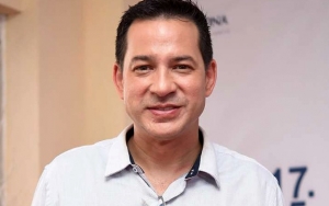 Ari Wibowo Singgung Bungkus Rokok Saat Tanggapi Kemungkinan Virus Corona di Indonesia