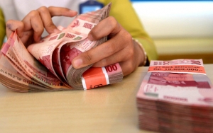 PNS Tetap Terima THR Walau Dipangkas Gegara Corona, Ini Jadwal Pencairannya