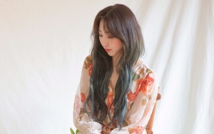 Minzy Tampilkan Sisi Lembut Dikelilingi Bunga Dalam Teaser MV Solo 'Lovely'