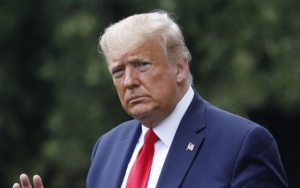 Trump Kembali Kecam Atlet yang Berlutut Saat Nyanyikan Lagu Kebangsaan AS