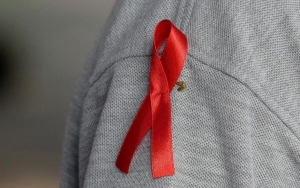 Mengenal Makna Pita Merah Sebagai Simbol Hari AIDS Sedunia