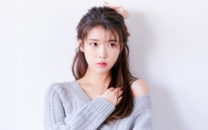 IU Kurang Dekat dengan Adik Laki-Lakinya?