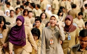 PNS Mau Nekat Liburan Akhir Tahun? Simak Dulu Risiko Sanksinya Berikut Ini