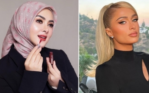 Penampilan Syahrini Ala Cewek Kue Dikomentari Paris Hilton