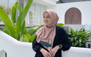 Dhini Aminarti