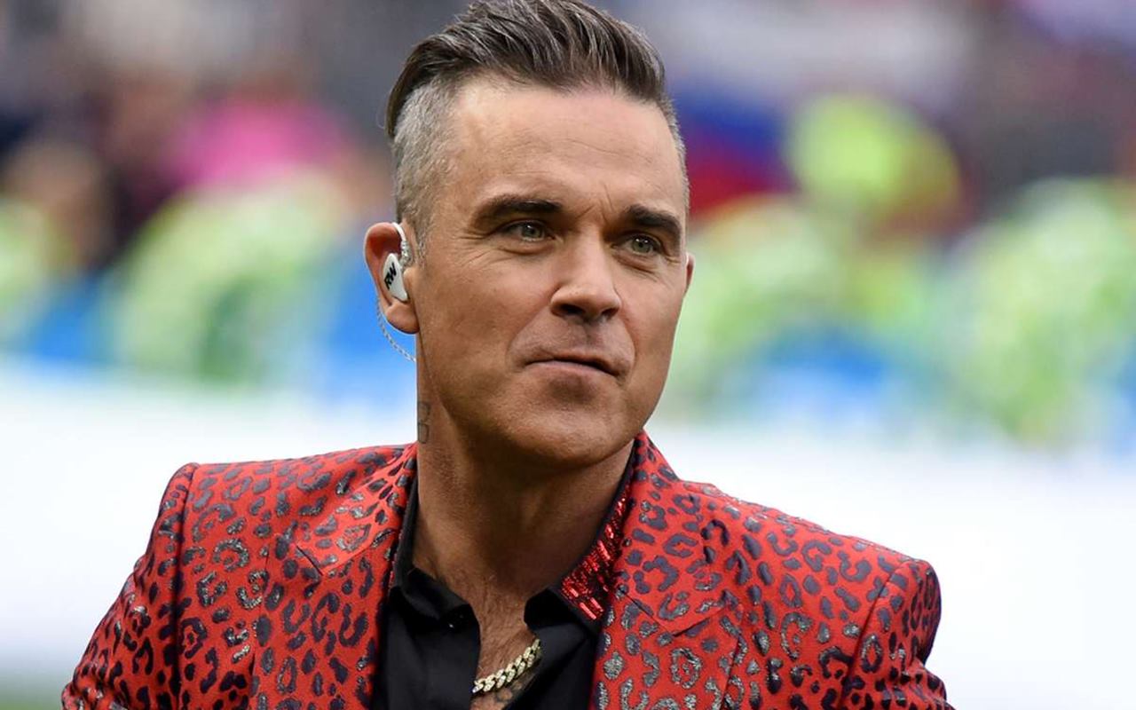 Robbie Williams Positif COVID-19 Saat Liburan, Terpaksa Karantina di Karibia