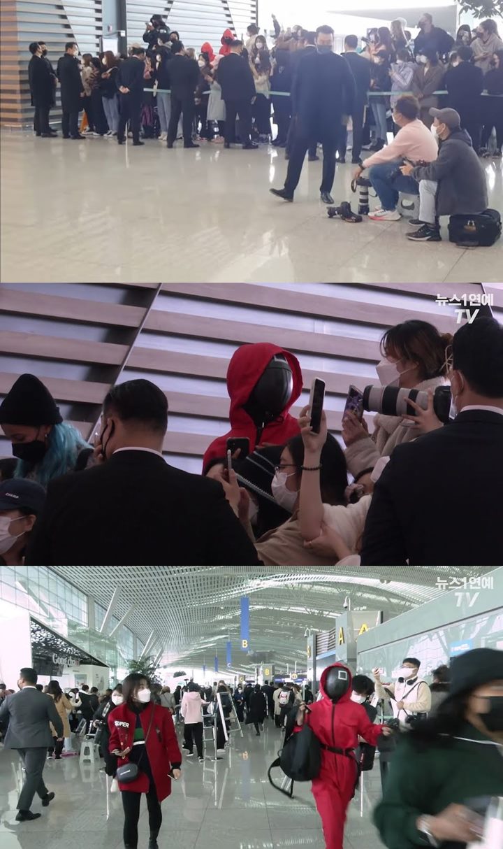 BTS \'Dikawal\' Petugas Keamanan \'Squid Game\' di Bandara, Tiba di LA dan Beri Kabar untuk Fans