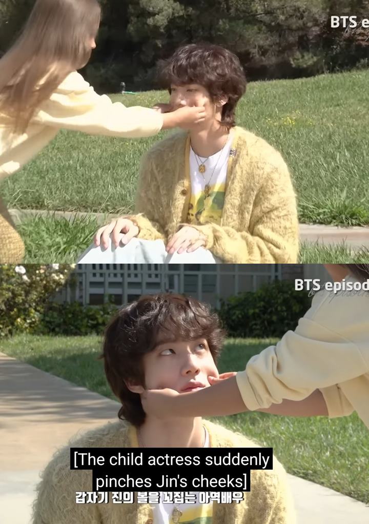 Momen Langka Penuh Makna, Jin BTS Ikhlas Pipinya Dicubiti Model Cilik MV \'The Astronaut\'