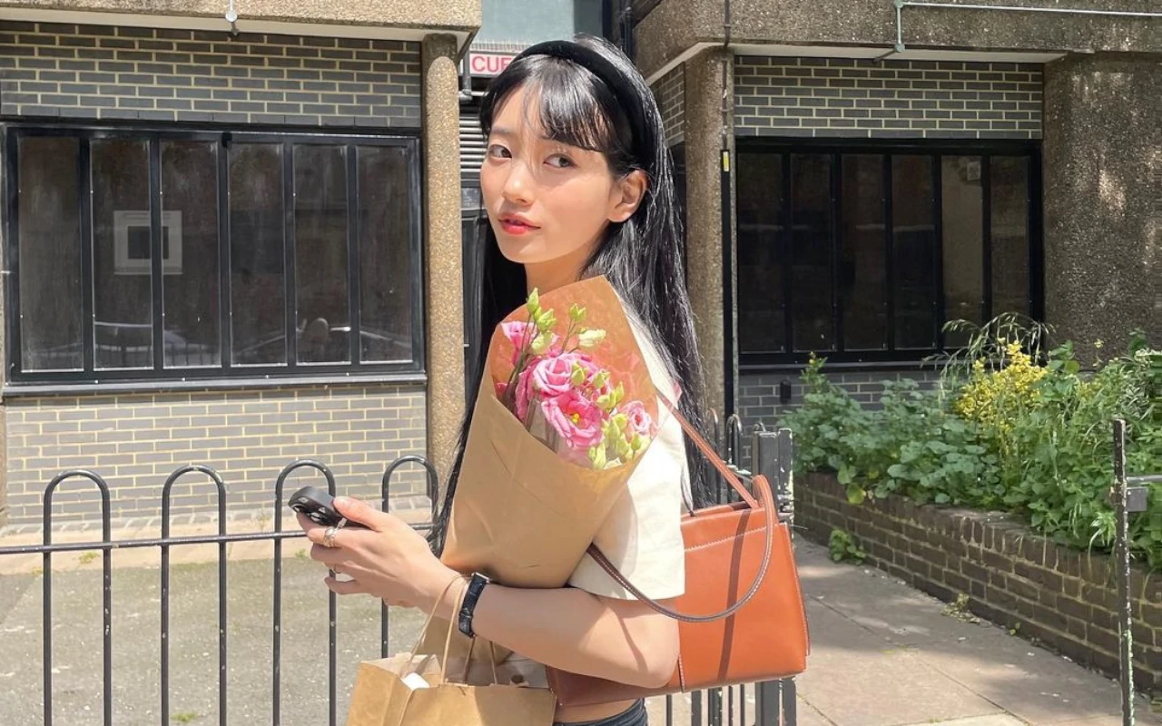 Bae Suzy Pancarkan Vibe Bak Peri di BTS Pemotretan dengan Hanbok