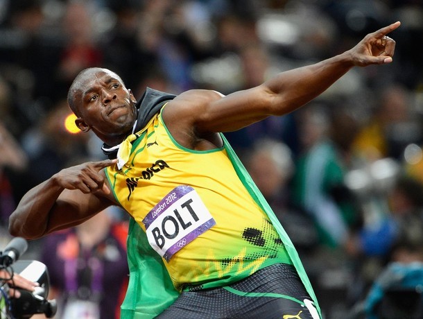 Gambar Foto Atlet Atletik Jamaika, Usain Bolt, Mendapatkan Medali Emas