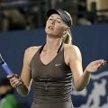 Reaksi Maria Sharapova saat dikalahkan Serena Williams di perempat final