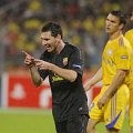 Lionel Messi melakukan selebrasi usai mencetak gol ke gawang BATE