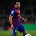 Xavi Hernandez di La Liga Match FC Barcelona and Sporting Gijon