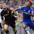 Ashley Cole dan James Milner Berebut Bola diPertandingan FA Community Shield Melawan Manchester City