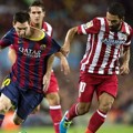 Lionel Messi Dihadang Oleh Arda Turan