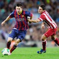 Koke Coba Hadang Pergerakan Lionel Messi