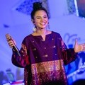Penampilan Andien di Aksi Sosial 'BerSHOEkur'