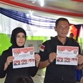Agus Harimurti Yudhoyono dan Annisa Pohan di TPS 6 Rawa Barat