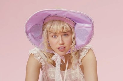Biasa Topless, Miley Cyrus Berubah Jadi Bayi Unyu di MV 'BB Talk'