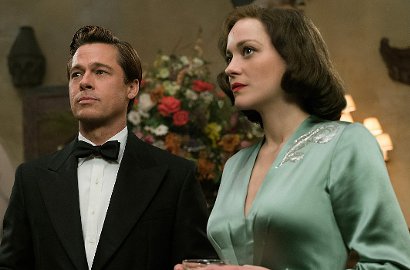 Bawa Senapan, Brad Pitt-Marion Cotillard Gandengan Tangan di Poster 'Allied'