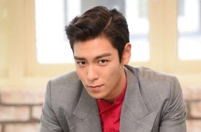 Gara-Gara Ganja, Wajah T.O.P Dihapus dari Iklan Big Bang di Tiongkok